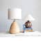 Hello Honey® 26.5" Beige Round Textured Stoneware Table Lamp with Natural Linen Shade